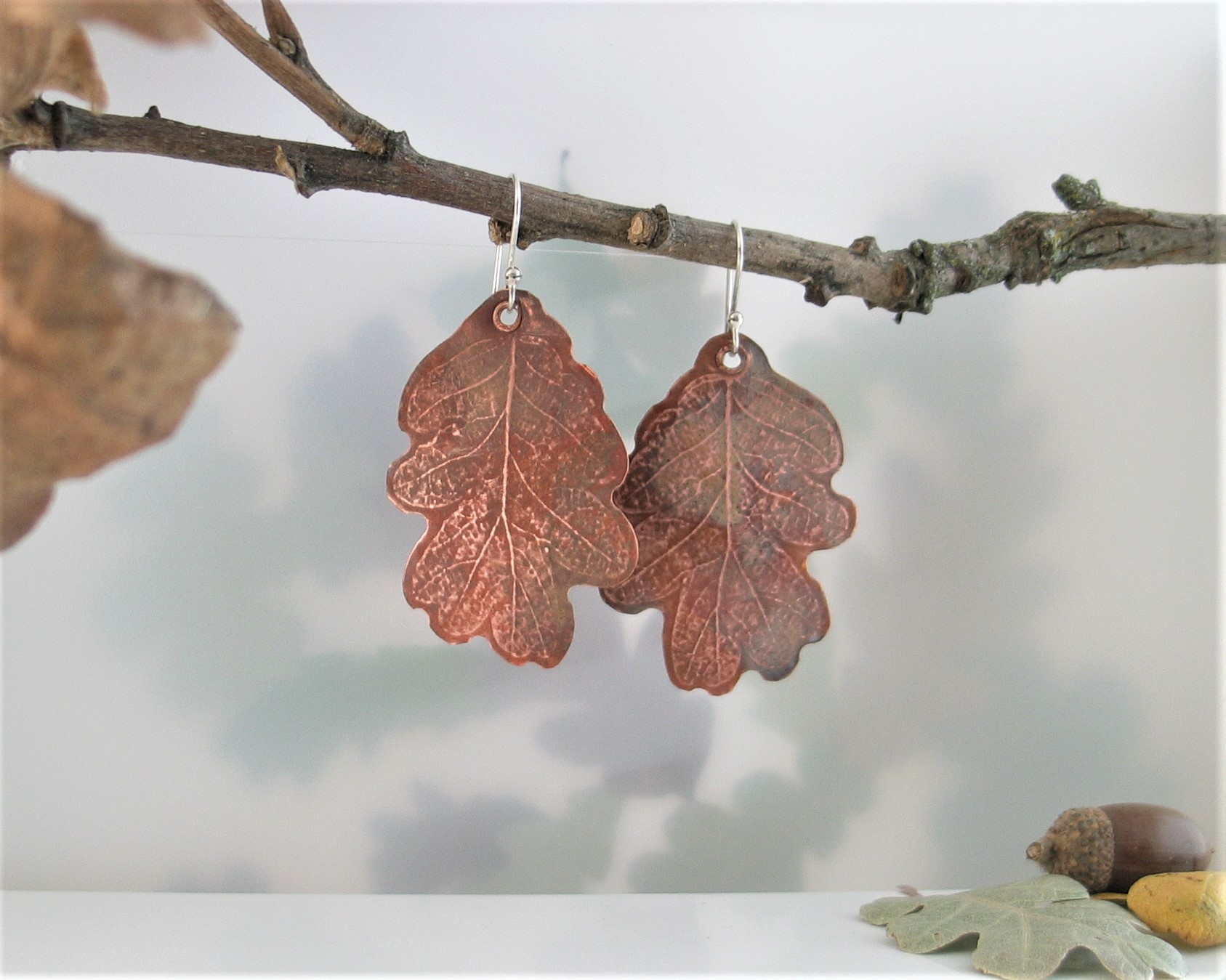 Small Copper oak shaped dangle earrings
